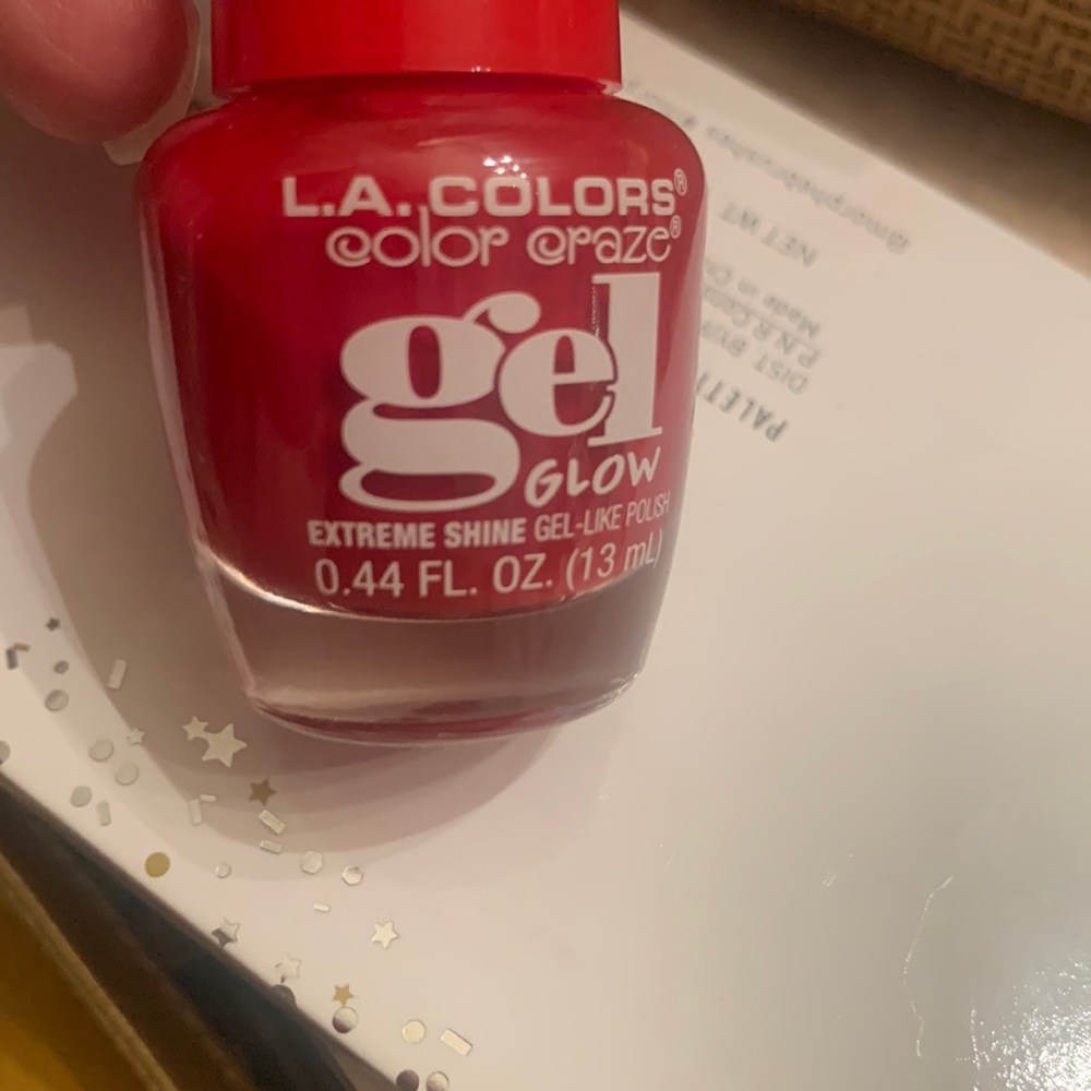 FREE!  Hot red Gel Nail polish. GLOWS in BLACK LIGHT!!!